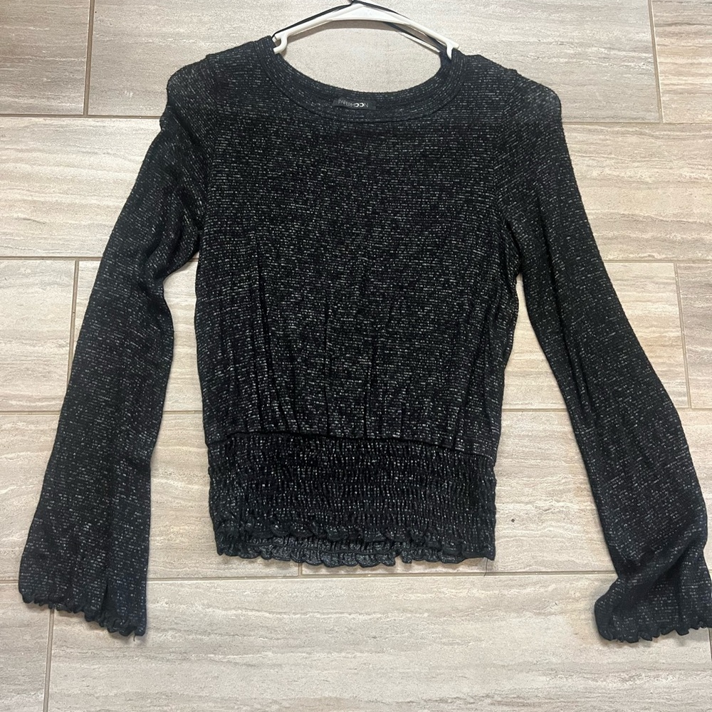 Smocked bottom & bell sleeves.
